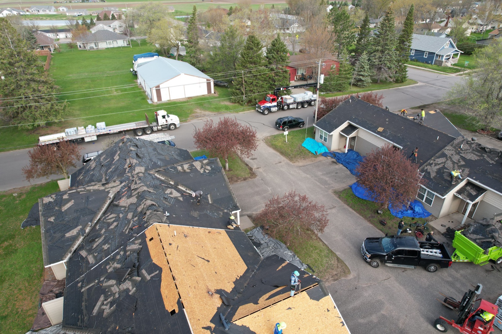 Neighborhood storm-restoration roof tear-off