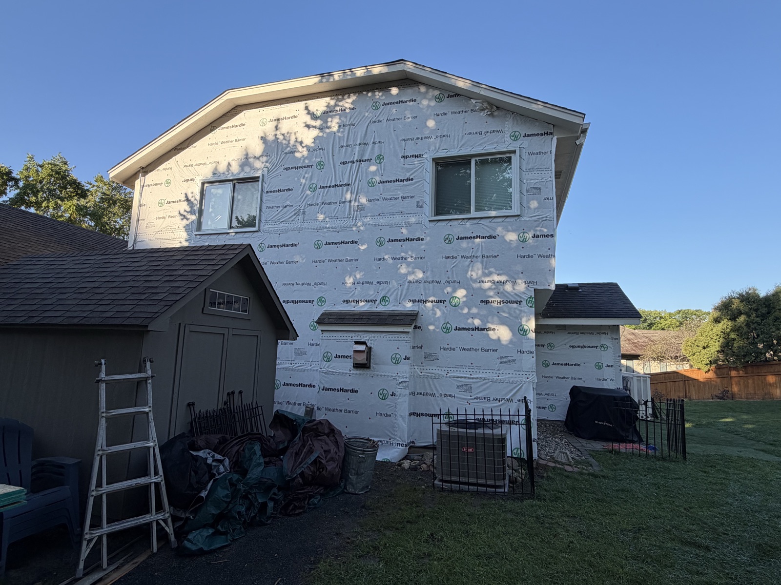 Steel and fiber-cement siding installation