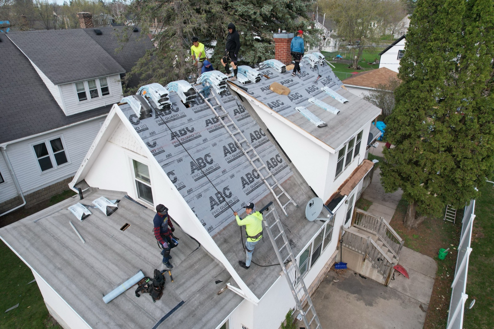 Roof replacement on a wide single-story home